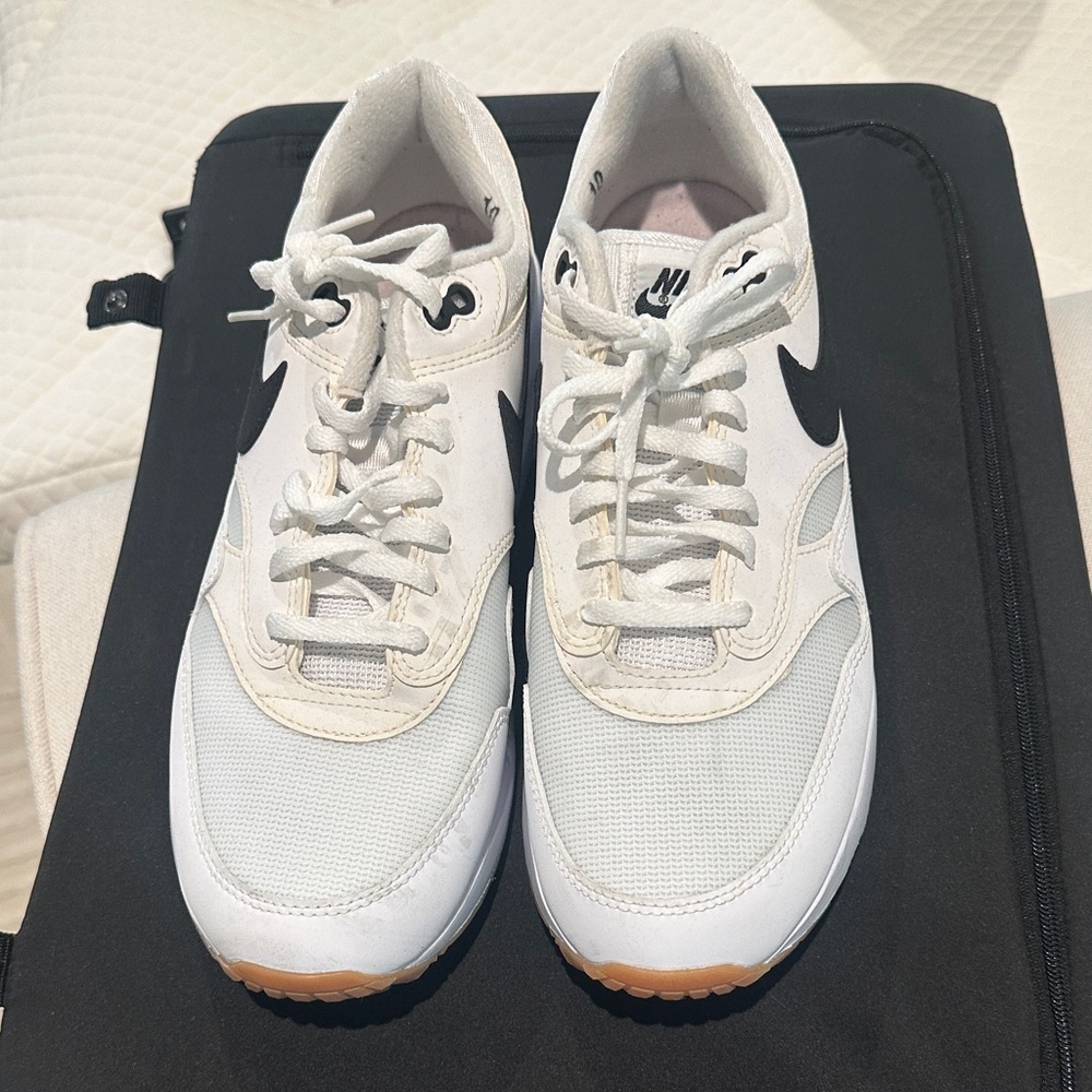 Nike Men’s White Sneakers with Black Swoosh and Gum Outsole